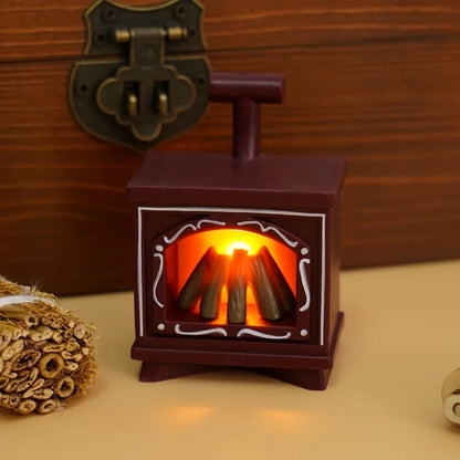 Miniaturowy kominek LED – dekoracja do domku dla lalek